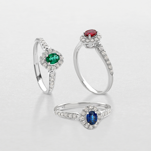 white gold with diamonds and precious color stones ring