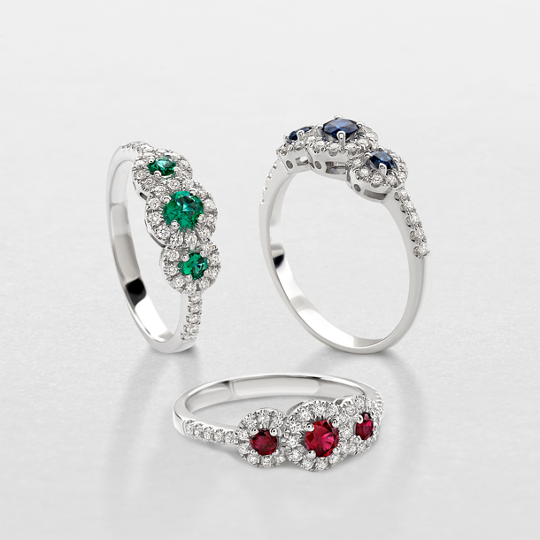 white gold with diamonds and precious color stones ring